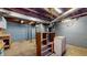 Spacious unfinished basement with concrete floors and utility fixtures at 1521 Pleasant St, Indianapolis, IN 46203
