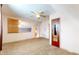 A comfortable carpeted bedroom features a ceiling fan and a mirrored closet door at 1521 Pleasant St, Indianapolis, IN 46203