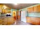 Traditional kitchen with light wood cabinets, and appliances at 1521 Pleasant St, Indianapolis, IN 46203