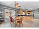 Open kitchen area featuring wood cabinets, an island, and a breakfast nook with an abundance of natural light at 17279 Crescent Moon Dr, Noblesville, IN 46060