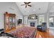 Inviting living room with a fireplace, stylish decor, and an open view to the dining area at 17279 Crescent Moon Dr, Noblesville, IN 46060