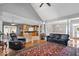 Open-concept living room seamlessly connected to the kitchen and dining area, featuring hardwood floors at 17279 Crescent Moon Dr, Noblesville, IN 46060