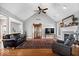 Comfortable living room with a vaulted ceiling, hardwood floors, and an open layout at 17279 Crescent Moon Dr, Noblesville, IN 46060