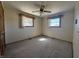 Bedroom with carpet, a ceiling fan and windows providing natural light at 2115 Leonard Rd, Martinsville, IN 46151