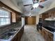 Bright kitchen features ample counter space, wood cabinets, and an eat-in area, great for Gathering meals at 2115 Leonard Rd, Martinsville, IN 46151
