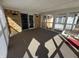 Sunroom featuring multiple windows and sliding door to backyard at 2115 Leonard Rd, Martinsville, IN 46151
