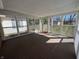 Bright sunroom with multiple windows offering natural light and backyard views at 2115 Leonard Rd, Martinsville, IN 46151