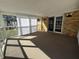 Sunroom featuring multiple windows and sliding door to backyard at 2115 Leonard Rd, Martinsville, IN 46151