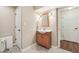 Charming bathroom with a classic vanity, updated mirror, and a neutral color palette at 307 Baywood Ct # 67, Noblesville, IN 46062