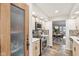 Charming kitchen with stainless steel oven, light wood cabinets and a glimpse of a bright dining area with natural light at 307 Baywood Ct # 67, Noblesville, IN 46062