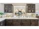 Modern kitchen featuring stylish cabinets, quartz countertops, and stainless steel appliances at 307 Baywood Ct # 67, Noblesville, IN 46062