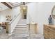 Bright staircase with skylights and wooden beams, leading to upper levels with modern design and ample natural light at 307 Baywood Ct # 67, Noblesville, IN 46062