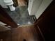 Close-up of bathroom floor tile, toilet, and cabinets at 3179 W 400 N, Fairland, IN 46126