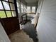 Sunroom entrance with stylish tile and bench seating at 3179 W 400 N, Fairland, IN 46126