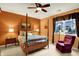 Beautiful bedroom with neutral walls, hardwood floors, and a window with natural light and furnishings at 3447 Heathcliff Ct, Westfield, IN 46074