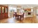 Comfortable dining room features hardwood floors, modern lighting, and large windows with lovely natural light at 3447 Heathcliff Ct, Westfield, IN 46074