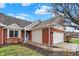 A beautiful red brick home with a two-car garage and well-maintained landscaping at 3447 Heathcliff Ct, Westfield, IN 46074