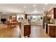 Bright kitchen features granite counters, stainless steel appliances, hardwood floors and breakfast bar, perfect for entertaining at 3447 Heathcliff Ct, Westfield, IN 46074