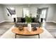 Inviting living room showcases stylish decor, warm lighting, and comfortable seating arrangement at 3601 Carrollton Ave, Indianapolis, IN 46205