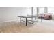 Finished basement area featuring a ping pong table, seating and neutral carpet at 3641 Shady Lake Dr, Westfield, IN 46074