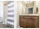 Bathroom with modern vanity, shower/tub combo, and neutral decor at 3641 Shady Lake Dr, Westfield, IN 46074