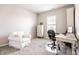 Cozy bedroom with natural light, carpeted floor, and a comfortable chair and desk at 3641 Shady Lake Dr, Westfield, IN 46074
