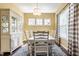 Dining room featuring natural light, modern light fixture, and dining table at 3641 Shady Lake Dr, Westfield, IN 46074
