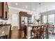 Modern kitchen with granite countertops, stainless steel appliances, and island seating at 3641 Shady Lake Dr, Westfield, IN 46074