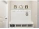 Mudroom with storage, coat hooks, bench seating, and cubbies for organization at 3641 Shady Lake Dr, Westfield, IN 46074