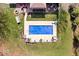 Aerial view of a backyard with a covered in-ground swimming pool and well-kept landscaping at 3976 Bent Tree Ln, Greenwood, IN 46143
