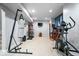 Finished basement with punching bag, exercise machine, and bar area at 3976 Bent Tree Ln, Greenwood, IN 46143