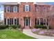 Beautiful brick home featuring meticulously maintained landscaping and a charming walkway to the front door at 3976 Bent Tree Ln, Greenwood, IN 46143