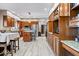 Kitchen featuring granite countertops, stainless steel appliances, and wooden cabinets at 3976 Bent Tree Ln, Greenwood, IN 46143