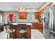 Kitchen featuring granite countertops, stainless steel appliances, and wooden cabinets at 3976 Bent Tree Ln, Greenwood, IN 46143