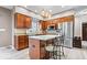 Kitchen featuring granite countertops, stainless steel appliances, and wooden cabinets at 3976 Bent Tree Ln, Greenwood, IN 46143