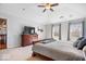 Spacious main bedroom with high ceilings, dresser with TV and neutral decor at 3976 Bent Tree Ln, Greenwood, IN 46143