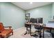Bright office space with modern desk setup, chair, and shelving at 3976 Bent Tree Ln, Greenwood, IN 46143