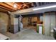 Unfinished basement with concrete floors and exposed utilities, including a furnace at 40 Twinshore Ct, Carmel, IN 46033