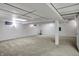 Spacious unfinished basement with carpet flooring, offering versatile possibilities at 40 Twinshore Ct, Carmel, IN 46033