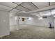Unfinished basement with carpet flooring, offering versatile space for storage or customization at 40 Twinshore Ct, Carmel, IN 46033