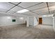 Large finished basement with neutral carpet and white walls at 40 Twinshore Ct, Carmel, IN 46033