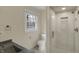Modern bathroom features a frameless glass shower and updated fixtures at 40 Twinshore Ct, Carmel, IN 46033
