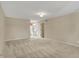 Spacious carpeted bedroom leading to a well-lit bathroom and dressing area at 40 Twinshore Ct, Carmel, IN 46033