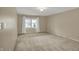 A simple bedroom with beige carpet at 40 Twinshore Ct, Carmel, IN 46033