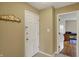 Welcoming entryway featuring a coat rack and a view into another room at 40 Twinshore Ct, Carmel, IN 46033
