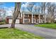 Beautiful brick home featuring a long driveway and well-maintained lawn at 40 Twinshore Ct, Carmel, IN 46033