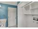 Laundry area including shelves and door to the bathroom at 40 Twinshore Ct, Carmel, IN 46033