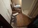 Bathroom needing renovation with damaged flooring and fixtures at 413 W 8Th St, Muncie, IN 47302