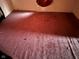 Bedroom with a red rug at 413 W 8Th St, Muncie, IN 47302