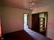 Bedroom featuring open closet and doorway at 413 W 8Th St, Muncie, IN 47302